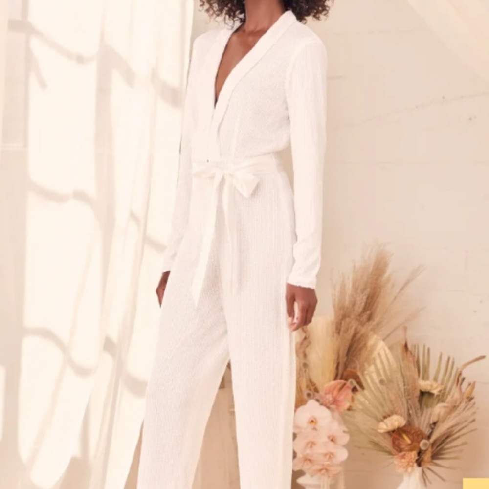 Never worn, tags still on. Sequin Long Sleeve Slim Leg Jumpsuit- Lulus
